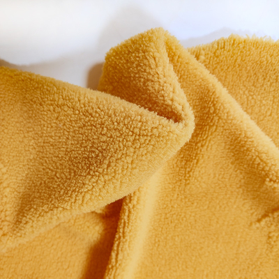 Sợi dọc dệt kim Sherpa Vải nỉ 100% Polyester màu vàng Jacquard cho ngành may mặc